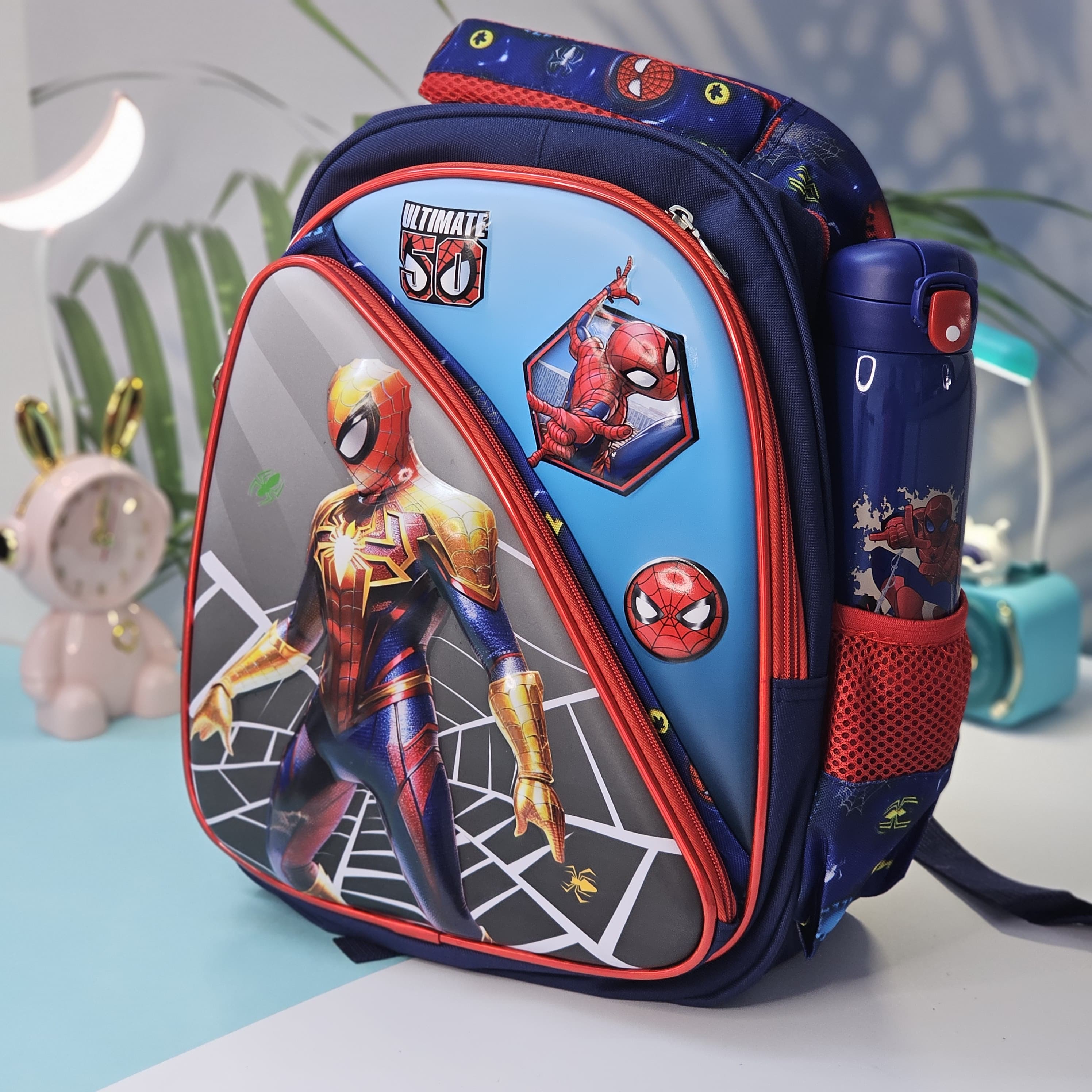 "Stylish and practical Usmile Toys backpack for boys, adorned with popular cartoon superhero characters, including Iron Man and Thor." www.usmile.toys
